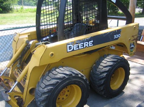 john deere 320 skid steer lift capacity|john deere 320 value.